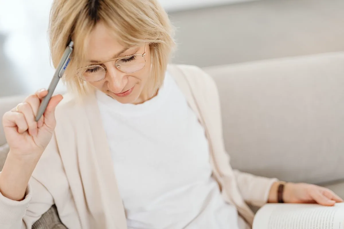 A woman in her late forties, relaxed